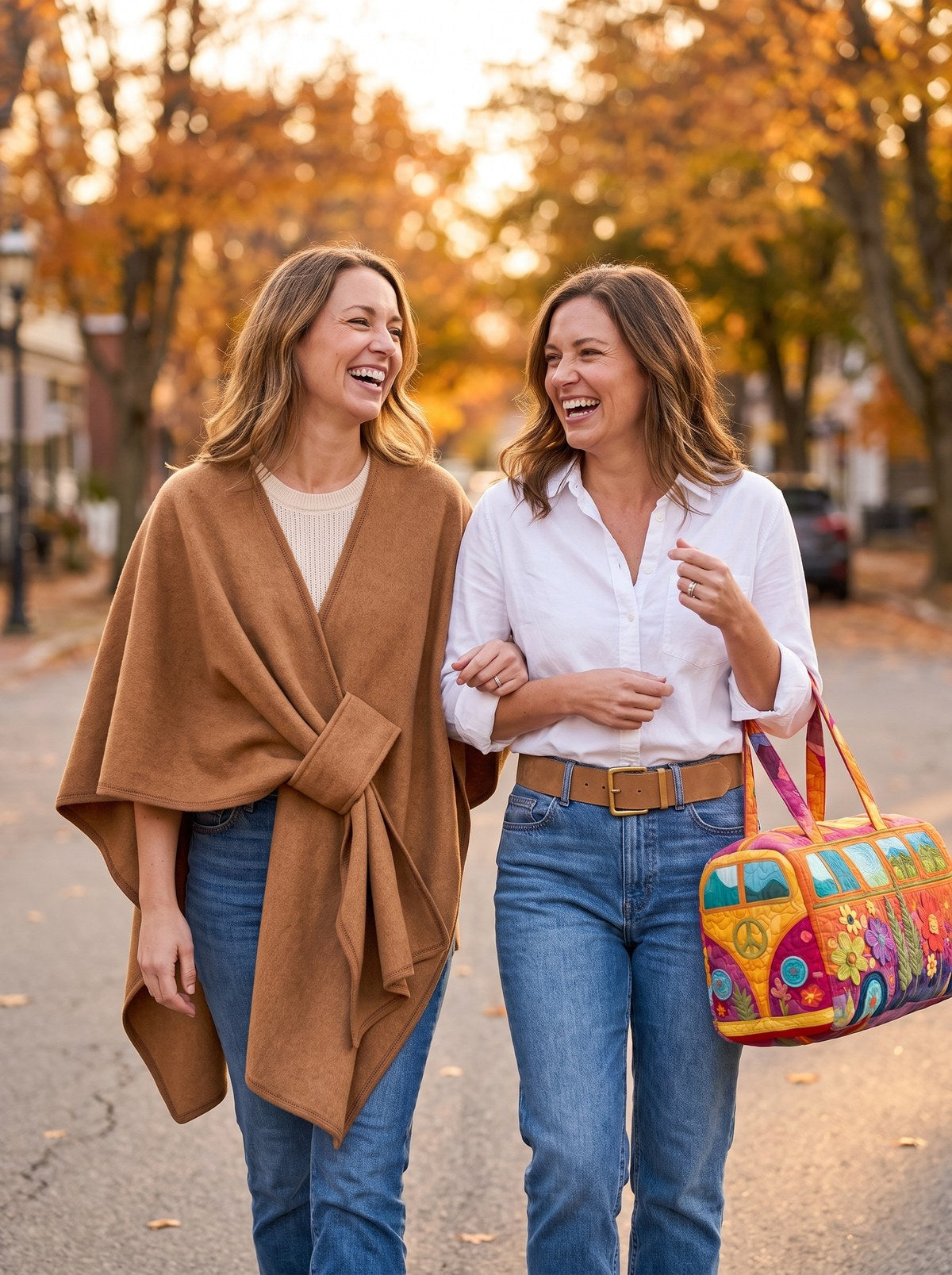 Two friends wearing the Bloopa wrap shawl, belt and boho bag